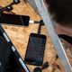 Illustration for article titled This Apocalypse-Ready Solar Charging Station Folds Up Behind a Bike